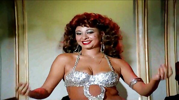 Redhead and brunette are having sex in the classroom