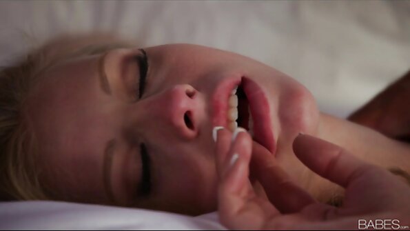 Three women are doing hardcore lesbian fucking with a dildo